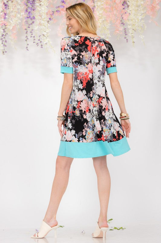 Celeste Full Size Floral Surplice Short Sleeve Dress with Pockets Plus Size - Smart Shopper